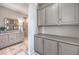 Hallway featuring stylish built-in storage and a decorative sideboard with mirrors at 4924 E Cactus Canyon Dr, Pahrump, NV 89061