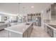 Modern kitchen with a large center island, stainless steel appliances, and designer finishes, creating a stylish and functional space at 4924 E Cactus Canyon Dr, Pahrump, NV 89061