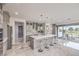 Modern kitchen featuring a large center island with bar seating and stainless steel appliances at 4924 E Cactus Canyon Dr, Pahrump, NV 89061