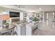 Bright living room featuring contemporary decor, ample seating, and large windows, ideal for relaxation and social gatherings at 4924 E Cactus Canyon Dr, Pahrump, NV 89061