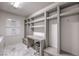 Organized mud room with custom built-ins, a desk area, and ample storage at 4924 E Cactus Canyon Dr, Pahrump, NV 89061