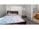 Inviting bedroom featuring a comfortable bed and a charming accent basket at 4996 Del Pueblo Ave, Las Vegas, NV 89141