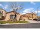 Lovely one-story home offering a two-car garage, manicured lawn, and low-maintenance shrubbery at 4996 Del Pueblo Ave, Las Vegas, NV 89141