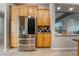 Kitchen featuring a stainless steel refrigerator and custom wood cabinetry at 4996 Del Pueblo Ave, Las Vegas, NV 89141