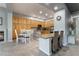 Kitchen with eat-in dining nook, granite countertops, and custom wood cabinetry at 4996 Del Pueblo Ave, Las Vegas, NV 89141