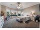 Comfortable main bedroom boasts lots of light and neutral colors at 4996 Del Pueblo Ave, Las Vegas, NV 89141