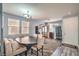 Dining area featuring lots of light, with modern flooring and comfortable seating at 5024 Granite Creek Ct, Las Vegas, NV 89131