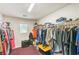 Walk-in closet with shelving and hanging racks for clothes and accessories at 5024 Granite Creek Ct, Las Vegas, NV 89131