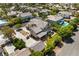 Beautiful aerial view of a two-story home with desert landscaping and a three-car garage in a residential neighborhood at 5128 Blissful Valley Cir, Las Vegas, NV 89149