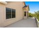Spacious balcony featuring secure railings and a view of greenery on a sunny day at 5128 Blissful Valley Cir, Las Vegas, NV 89149