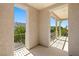 Charming balcony featuring decorative railing, stucco walls, and an elegant covered ceiling at 5128 Blissful Valley Cir, Las Vegas, NV 89149