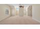 Large bonus room with high vaulted ceilings, carpet flooring, and great natural light at 5128 Blissful Valley Cir, Las Vegas, NV 89149