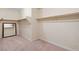 Walk-in closet with carpet flooring, ample storage space, and neutral-colored walls at 5128 Blissful Valley Cir, Las Vegas, NV 89149