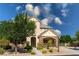 Charming two-story home with stone accents, covered porch, and a beautifully landscaped front yard at 5128 Blissful Valley Cir, Las Vegas, NV 89149