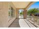 Covered front porch with stone accents and gated entry at 5128 Blissful Valley Cir, Las Vegas, NV 89149