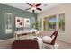 Bright home office with large windows, modern decor, and comfortable seating for remote work at 5128 Blissful Valley Cir, Las Vegas, NV 89149