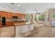 Modern kitchen showcasing granite countertops, ample cabinet space, and an open layout for easy entertaining at 5128 Blissful Valley Cir, Las Vegas, NV 89149