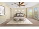 Serene main bedroom with soft lighting, plush carpeting, and stylish decor for ultimate relaxation at 5128 Blissful Valley Cir, Las Vegas, NV 89149