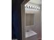 Bathroom featuring a mirror, white cabinet and vanity with a sink and a wall light at 5175 Palmyra Ave, Las Vegas, NV 89146