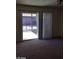 Bedroom featuring a sliding glass door to the backyard at 5175 Palmyra Ave, Las Vegas, NV 89146