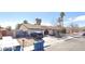 Pleasant single-story home, featuring a two-car garage and well-maintained landscaping at 5175 Palmyra Ave, Las Vegas, NV 89146