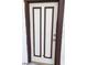 Classic white paneled front door with stylish contrasting trim, a welcoming entryway at 5175 Palmyra Ave, Las Vegas, NV 89146