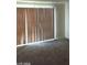 Bright living room features a large window with blinds providing natural light and privacy at 5175 Palmyra Ave, Las Vegas, NV 89146