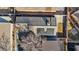Aerial view of the rooftop showing tile roofing, solar panels and compact backyard with a patch of grass at 5184 Mineral Lake Dr, Las Vegas, NV 89122