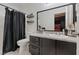 Well-maintained bathroom with granite countertops, modern fixtures, and shower at 5184 Mineral Lake Dr, Las Vegas, NV 89122