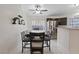 Inviting dining area with a large table, seating for six, and convenient access to the kitchen at 5184 Mineral Lake Dr, Las Vegas, NV 89122