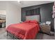 Comfortable bedroom with a queen bed, and walk in closet at 5184 Mineral Lake Dr, Las Vegas, NV 89122
