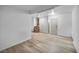 Spacious basement with neutral walls, plank flooring, and access to a bathroom at 54 Del Amo Dr, Las Vegas, NV 89110