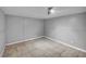This bedroom features a large tile floor, neutral gray walls, and recessed lighting at 54 Del Amo Dr, Las Vegas, NV 89110