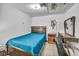 Bedroom featuring a cozy sleeping area with tile floors and minimal decor at 54 Del Amo Dr, Las Vegas, NV 89110