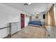 Cozy bedroom with a ceiling fan, tiled floor, and ample natural light at 54 Del Amo Dr, Las Vegas, NV 89110
