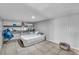 Bedroom featuring white walls, tiled floor, and neutral furnishings at 54 Del Amo Dr, Las Vegas, NV 89110
