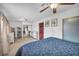 Bedroom with tiled floor and a mirrored sliding closet door at 54 Del Amo Dr, Las Vegas, NV 89110
