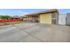 Single story home featuring a driveway and a front exterior with desert landscaping at 54 Del Amo Dr, Las Vegas, NV 89110