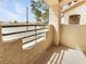 A cozy private balcony provides an intimate outdoor space with views of the neighborhood at 5415 W Harmon Ave # 2048, Las Vegas, NV 89103