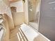 Cozy balcony area with privacy wall and sliding glass door access, offering a private outdoor space at 5415 W Harmon Ave # 2048, Las Vegas, NV 89103