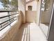 Balcony with railings offers an outdoor space to relax and enjoy the surrounding views at 5415 W Harmon Ave # 2048, Las Vegas, NV 89103