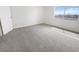 Bedroom showcasing a sunlit space through a large window, offering a bright and airy ambiance at 5415 W Harmon Ave # 2048, Las Vegas, NV 89103