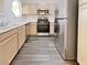 A well-lit kitchen features modern stainless appliances and white cabinets, offering a clean and efficient space at 5415 W Harmon Ave # 2048, Las Vegas, NV 89103