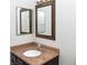 A bathroom featuring a single sink vanity with a tan countertop at 5650 E Sahara Ave # 2062, Las Vegas, NV 89142