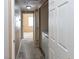 Hallway with carpet, lighting, and a bedroom view at 5650 E Sahara Ave # 2062, Las Vegas, NV 89142