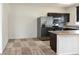 Kitchen featuring stainless steel appliances, dark cabinets, and ample counter space at 5650 E Sahara Ave # 2062, Las Vegas, NV 89142