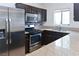 Well-equipped kitchen with stainless steel appliances, granite countertops, and a stainless sink at 5650 E Sahara Ave # 2062, Las Vegas, NV 89142
