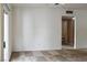 Inviting living room with carpet, slider door, and an open view to an adjacent bathroom at 5650 E Sahara Ave # 2062, Las Vegas, NV 89142