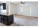 Bright living room featuring neutral carpet and a sliding glass door for natural light at 5650 E Sahara Ave # 2062, Las Vegas, NV 89142