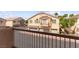 Exterior view featuring three-story building with three car garage at 6029 Mustang Breeze Trl # 101, Henderson, NV 89011
